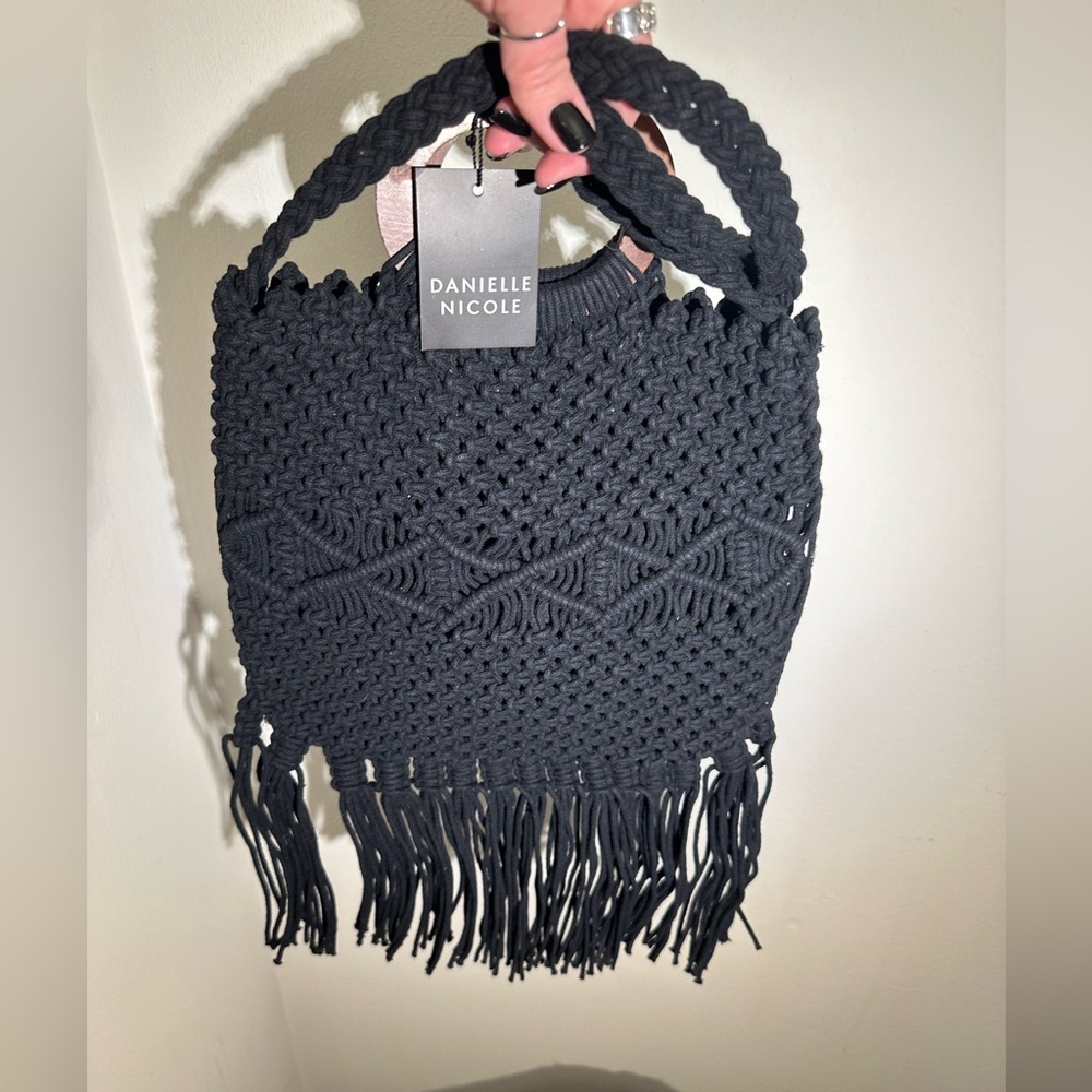 Black Danielle Nicole macrame bag.